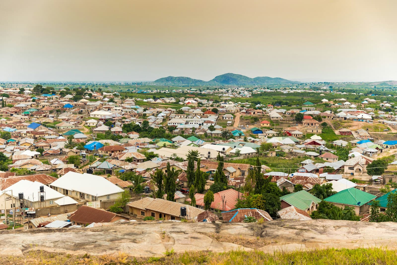 Rows of homes stretching to the hills in Abuja